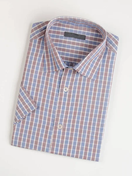 Shirt for men's folded on a background. — Stock Photo, Image