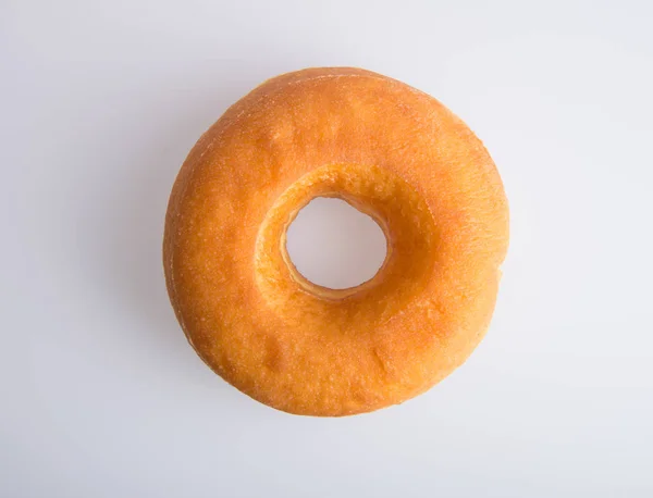 Donut ou saboroso donut no fundo . — Fotografia de Stock