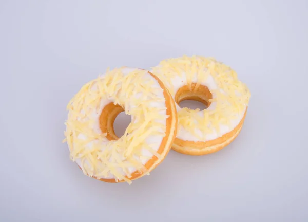 Donut of smakelijke donut op de achtergrond. — Stockfoto