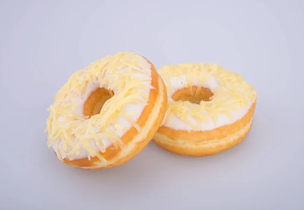 Donut of smakelijke donut op de achtergrond. — Stockfoto