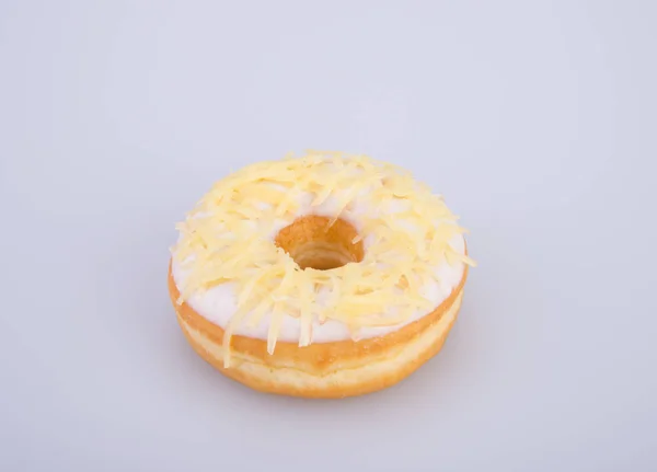 Donut lub smaczne pączki na tle. — Zdjęcie stockowe