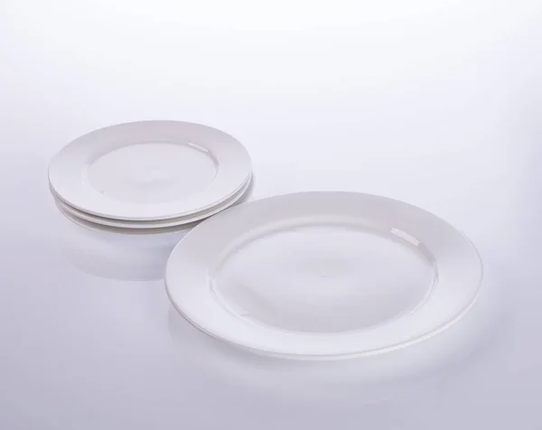 Plate or ceramic tableware on the background. Stock Photo