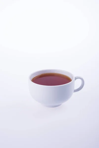 Tè o tazza di tè caldo su uno sfondo . — Foto Stock