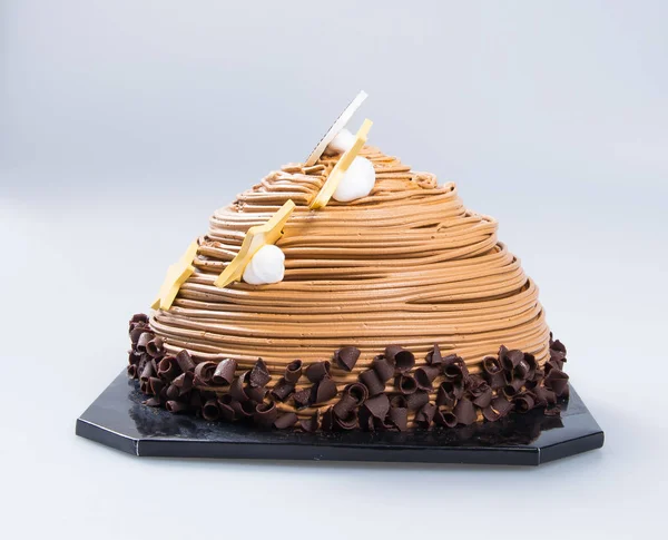 Tort lub ciasto czekoladowe na tle. — Zdjęcie stockowe