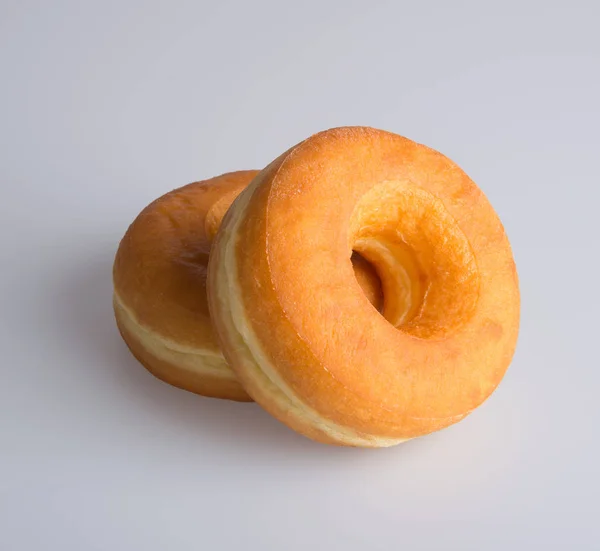 Donut oder leckerer Donut auf dem Hintergrund. — Stockfoto