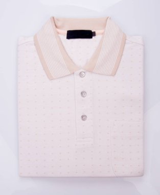 gömlek ya da erkek polo gömlek arka plan üzerinde katlanmış.