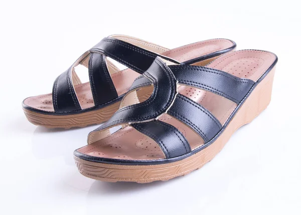 bir arka plan üzerinde ayakkabı ya da kadın sandalet