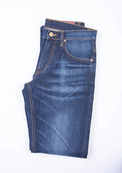 Jeans of blue jeans op een achtergrond. — Stockfoto