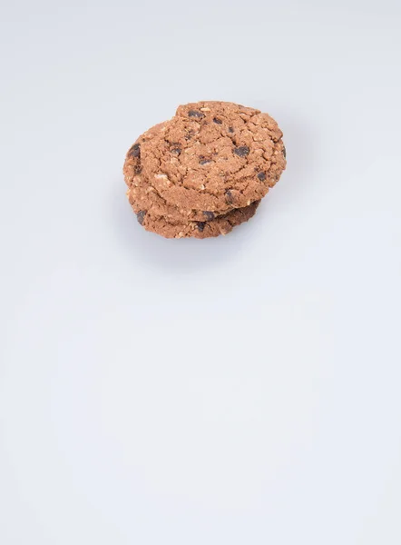Kekse oder Schokokekse auf einem Hintergrund. — Stockfoto