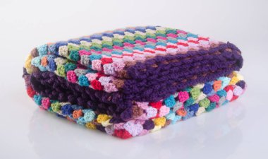 battaniye veya tığ işi battaniye bir arka plan üzerinde