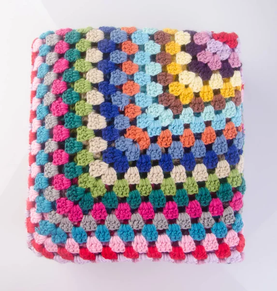blanket or crochet blanket on a background.