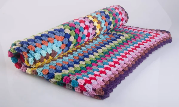 blanket or crochet blanket on a background.