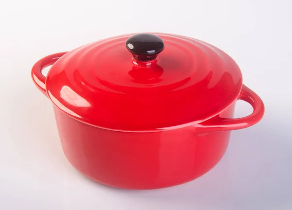 Pot or red pot with cover on background. — Stock Photo, Image