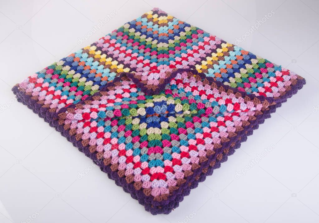 blanket or crochet blanket on a background.