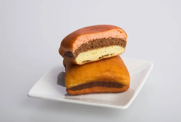 Donut oder frischer Donut auf einem Hintergrund. — Stockfoto