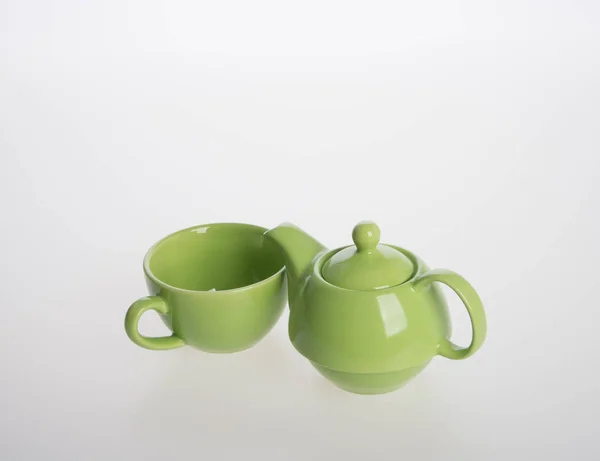 Набір чайного горщика або порцеляновий чайний горщик і чашка на фоні . — стокове фото