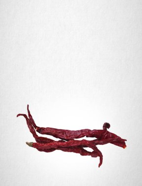 Biber veya bir arka plan üzerinde kuru kırmızı biber.