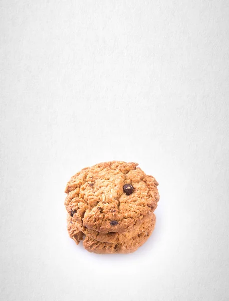 Cookies ou biscoitos de chocolate em segundo plano . — Fotografia de Stock