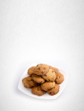 tanımlama bilgilerini veya bir arka plan üzerinde çikolata kurabiye.