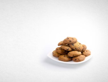 tanımlama bilgilerini veya bir arka plan üzerinde çikolata kurabiye.