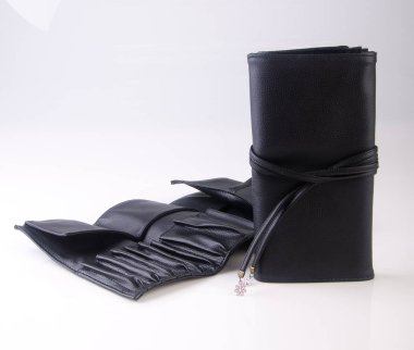 bir arka plan üzerinde makyaj çantası veya kozmetik çantası