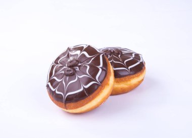 çörek veya bir arka plan üzerinde çikolatalı çörek.