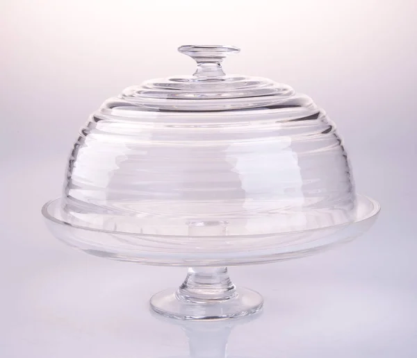 cake stand or glass cake tray on a backgeound