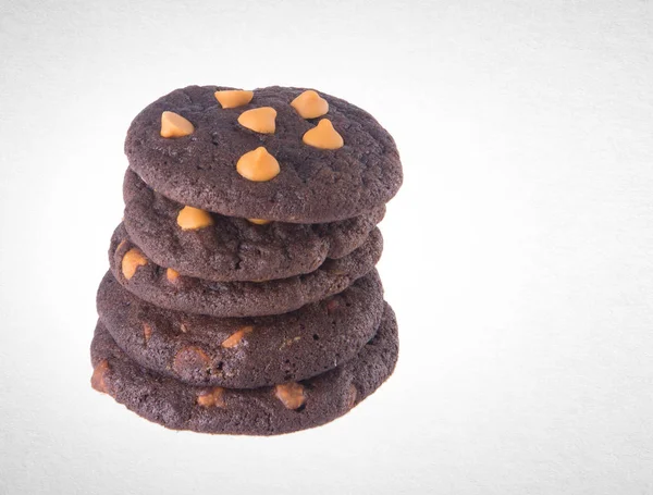 Cookies of cookies van chocolade chips op achtergrond. — Stockfoto