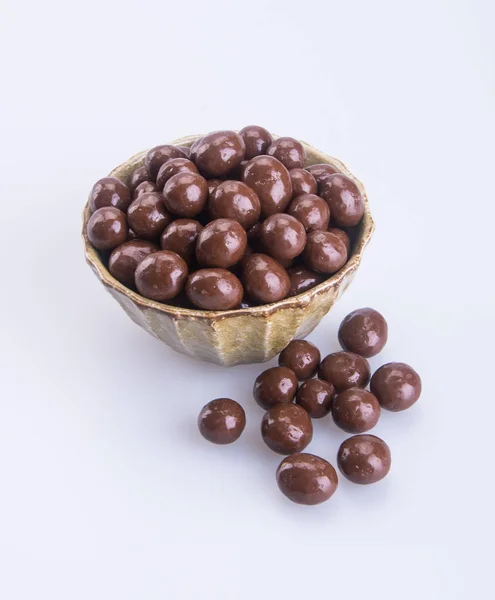 Chokladbollar. chokladbollar i skål på en bakgrund — Stockfoto