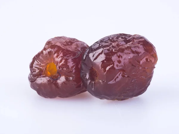 Geconserveerde vruchten. Chinese suiker datum bewaard vruchten op de bac — Stockfoto