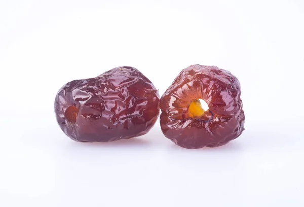 Konzervované ovoce. Datum čínské cukrem Konzervované ovoce na bac — Stock fotografie