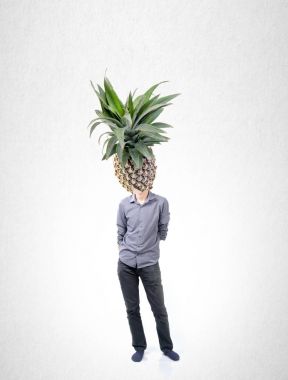 Man and pineapple with concept on a background. clipart