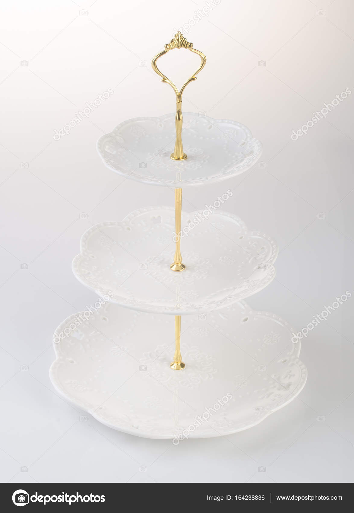 Tray Or Three Tier Serving Tray On A Background Stock Photo