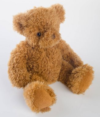 oyuncak ya da oyuncak ayı bir arka plan üzerinde.