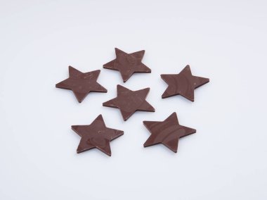 Bir arka plan üzerinde çikolata veya çikolata yıldız.