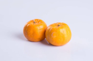 mandalina veya arka planda clementine.