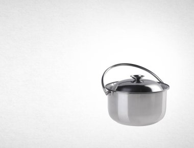 pot veya paslanmaz çelik bir arka plan üzerinde pot pişirme.