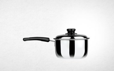 pot veya paslanmaz çelik bir arka plan üzerinde pot pişirme.