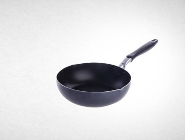 bir arka plan üzerinde tava ya da metal kızartma tavası