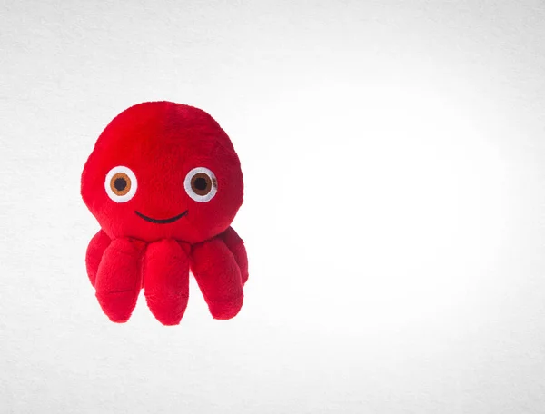 Toy or octopus soft toy on the background. — Stock Photo, Image