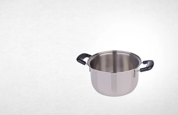 Pot veya paslanmaz çelik bir arka plan üzerinde pot pişirme. — Stok fotoğraf