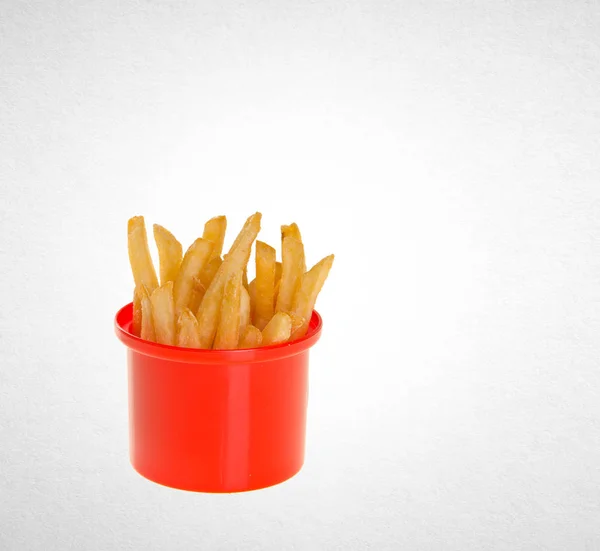 Franse frietjes of verse frietjes op een achtergrond. — Stockfoto