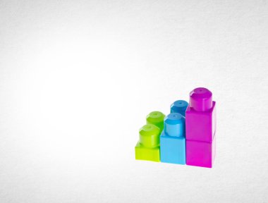 Plastik yapı taşları veya bir arka plan üzerinde Lego blokları