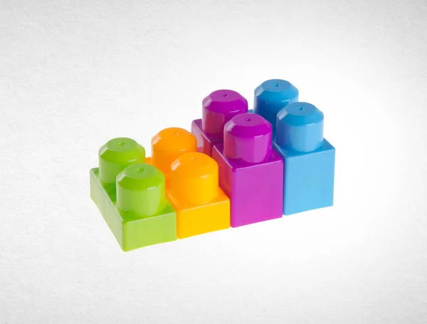 Plast byggstenar eller Lego block på en bakgrund. — Stockfoto