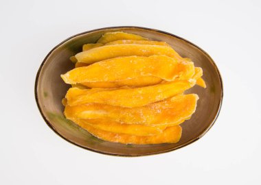 Bir arka plan üzerinde kurutulmuş Mango veya kurutulmuş Mango dilimleri.