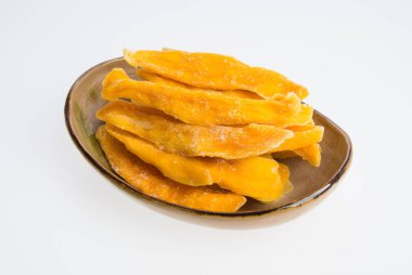 Bir arka plan üzerinde kurutulmuş Mango veya kurutulmuş Mango dilimleri.