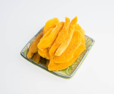 Bir arka plan üzerinde kurutulmuş Mango veya kurutulmuş Mango dilimleri.
