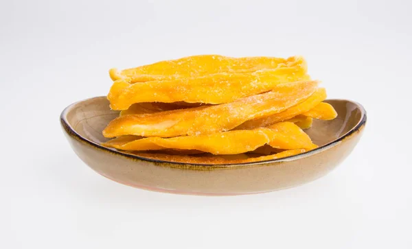 Dried Mango or Dried Mango slices on a background. — Stock Photo, Image