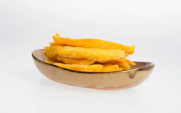 Dried Mango or Dried Mango slices on a background. — Stock Photo, Image