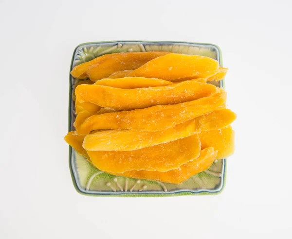 Dried Mango or Dried Mango slices on a background. — Stock Photo, Image
